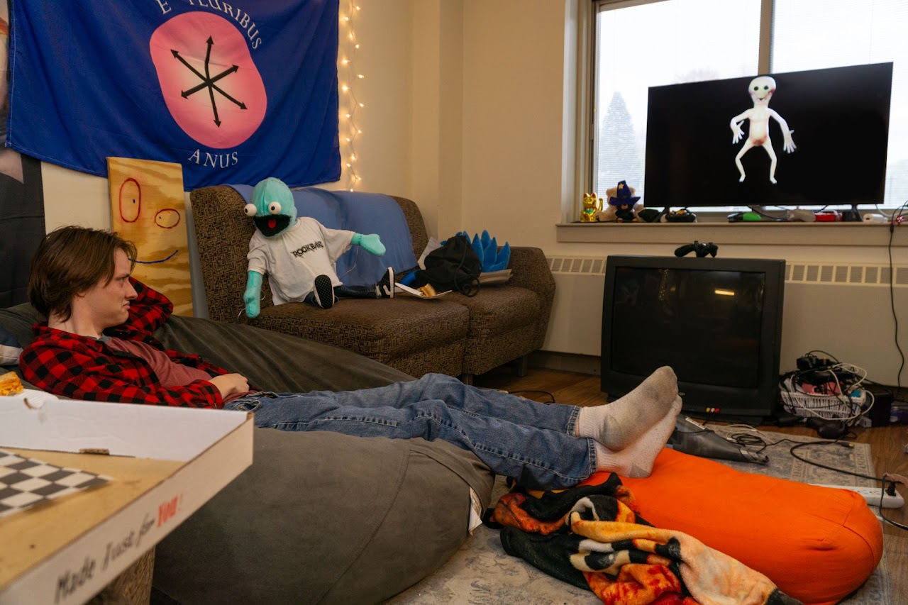Chet and his roommate are watching tv together, the roommate doesn't understand what the appeal of the show is.