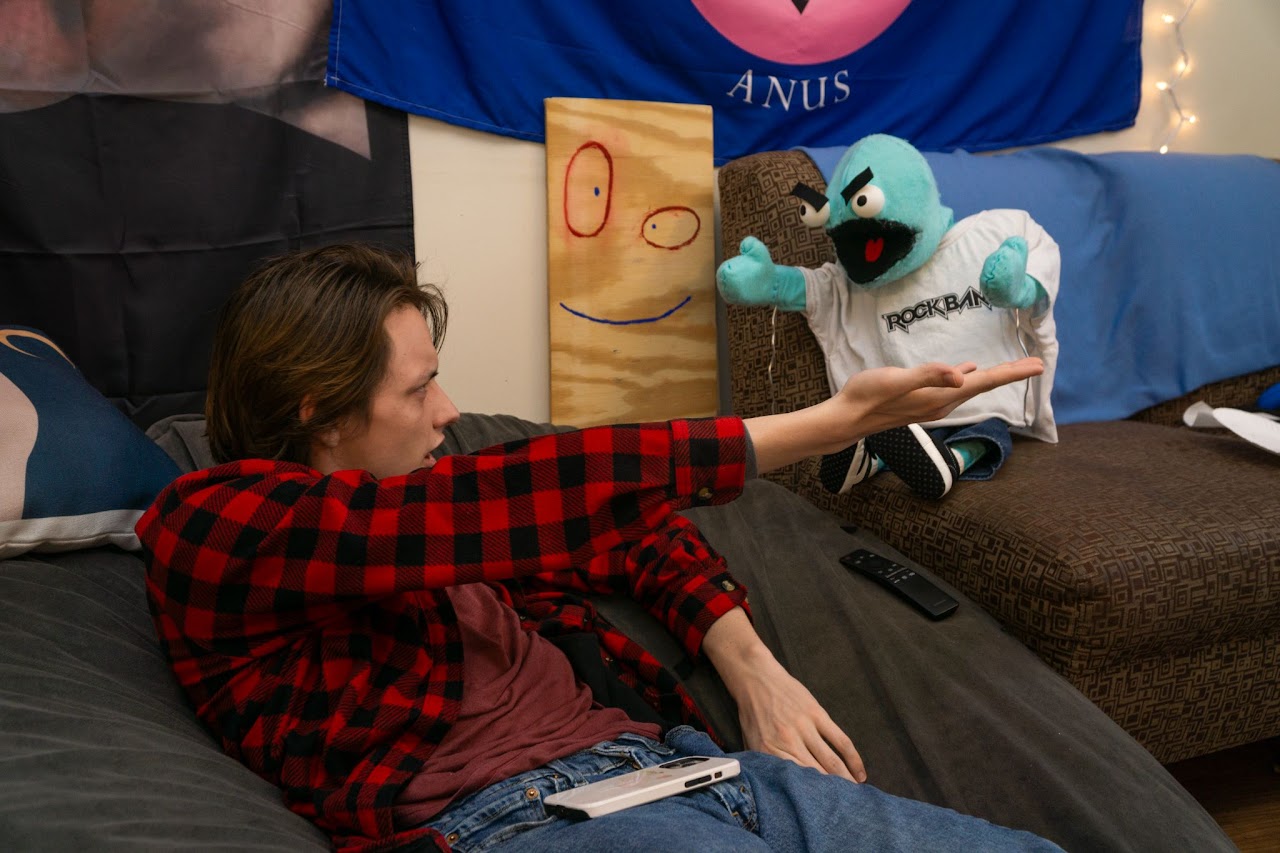 Chet and the roomate begin to argue.
