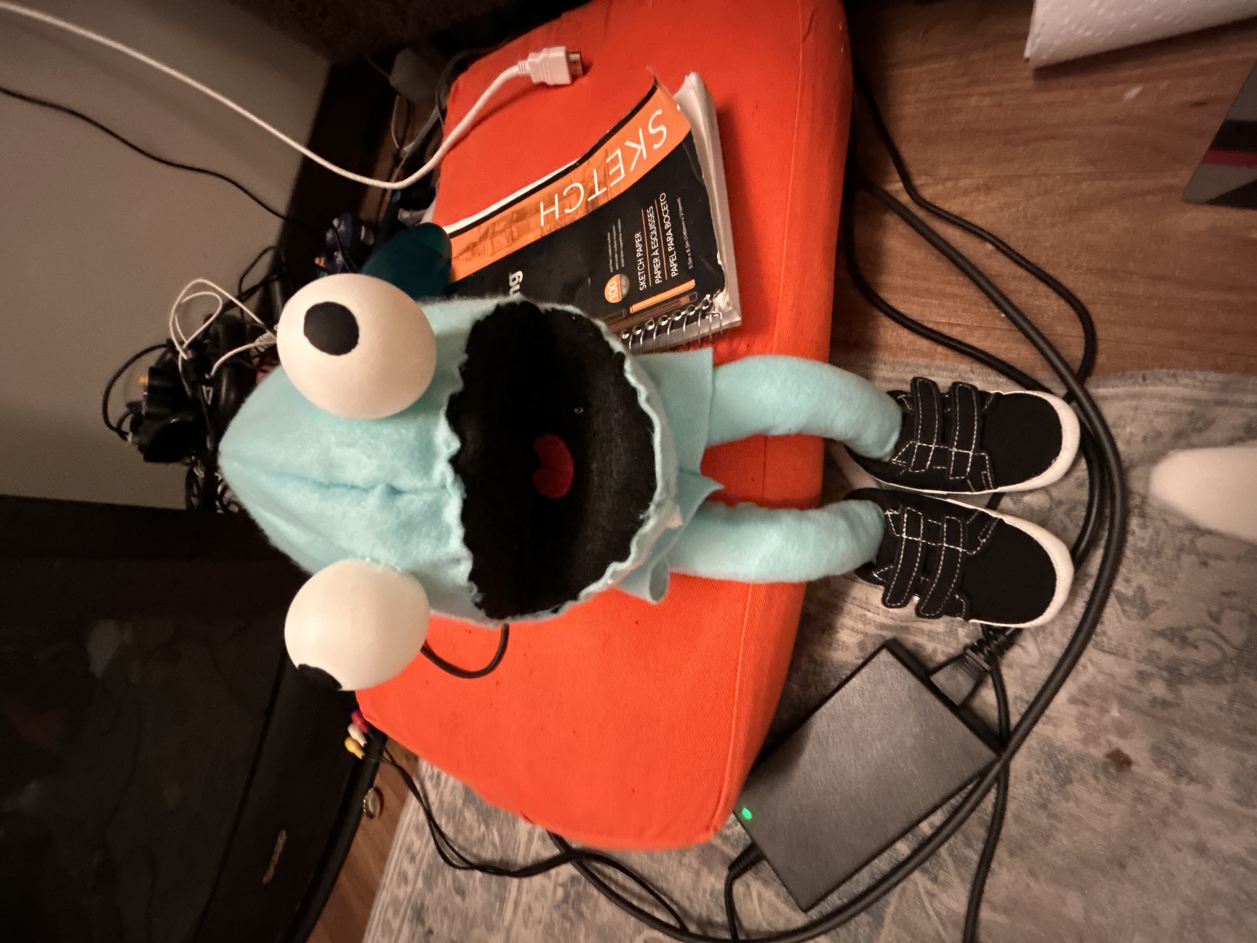 The first Chet puppet being constructed, at this point all he is is a pair of legs popping out of his head.