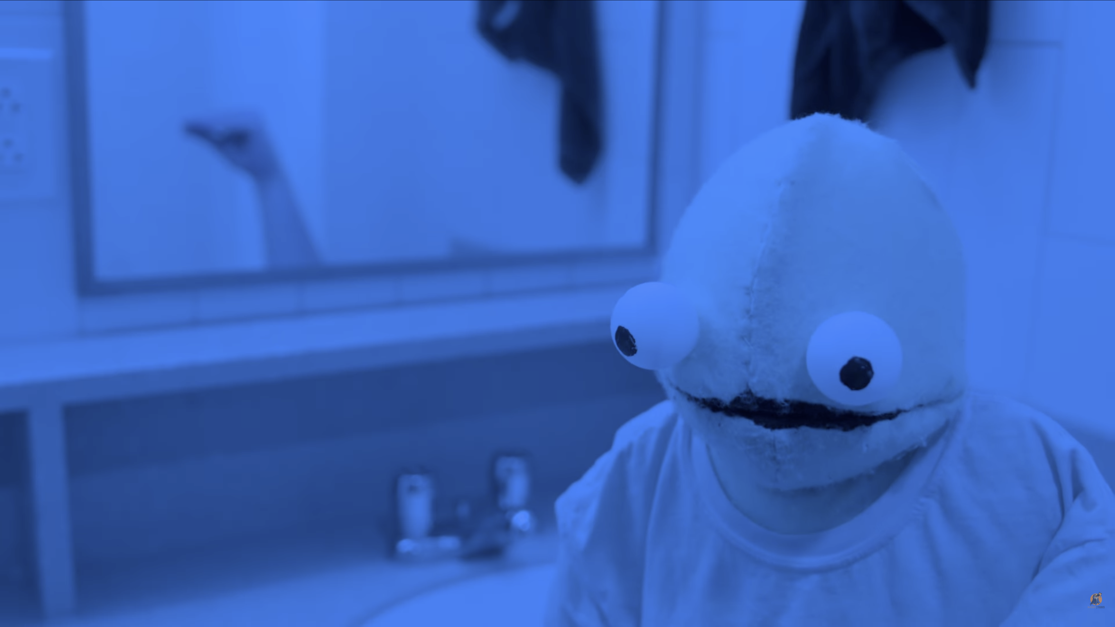 Screenshot from Chet Goes to a Party, this scene is when Chet rejects the white rabbit, surrounding himself in blue tones.